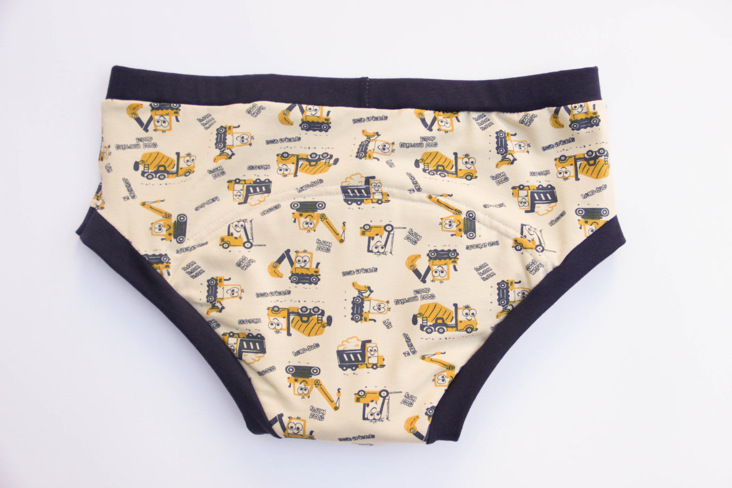 ABDL training pants for adult Tractors on a beige background