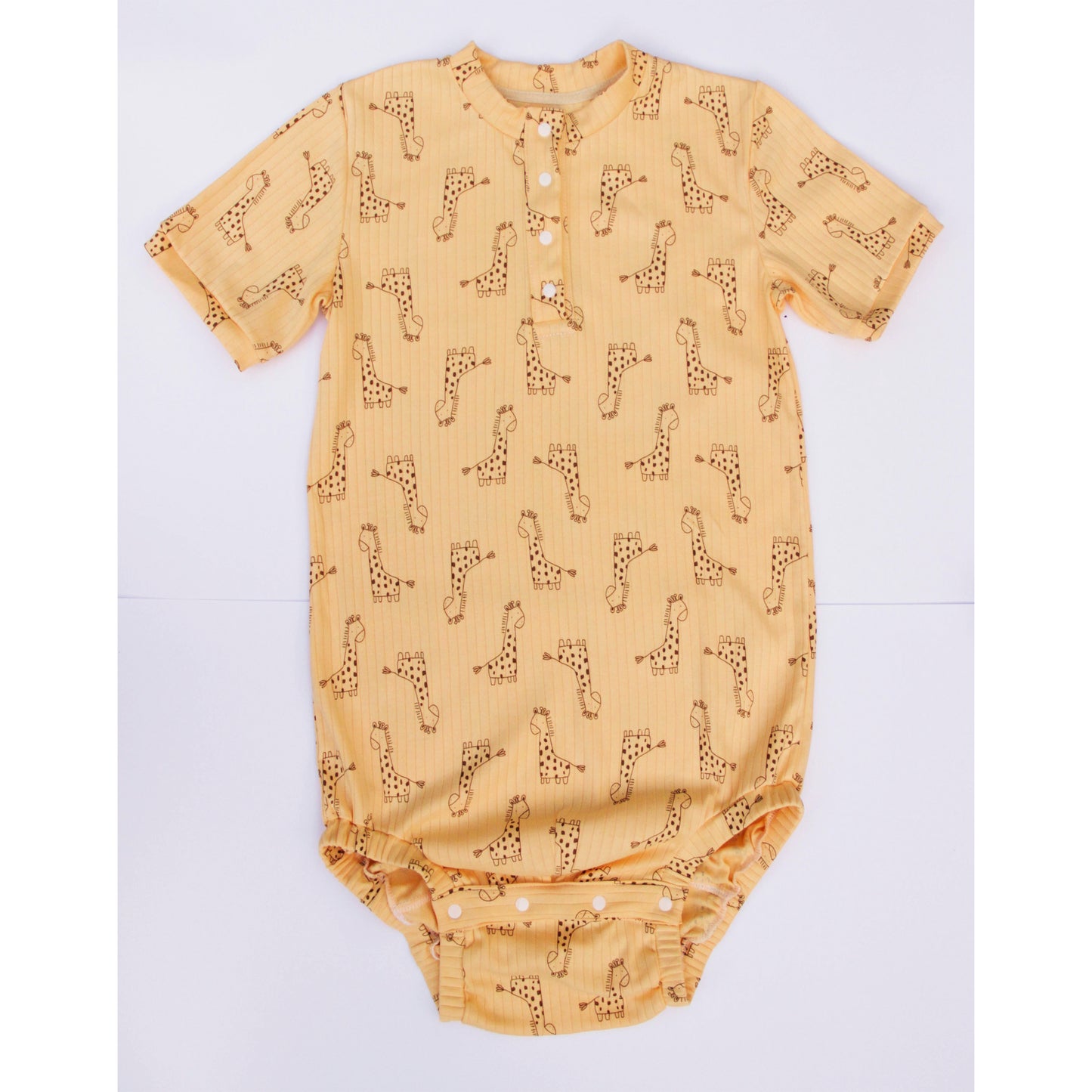 Adult onesie with shoulder snaps and bottom closure, diaper friendly, adult sizes S–8XL.
