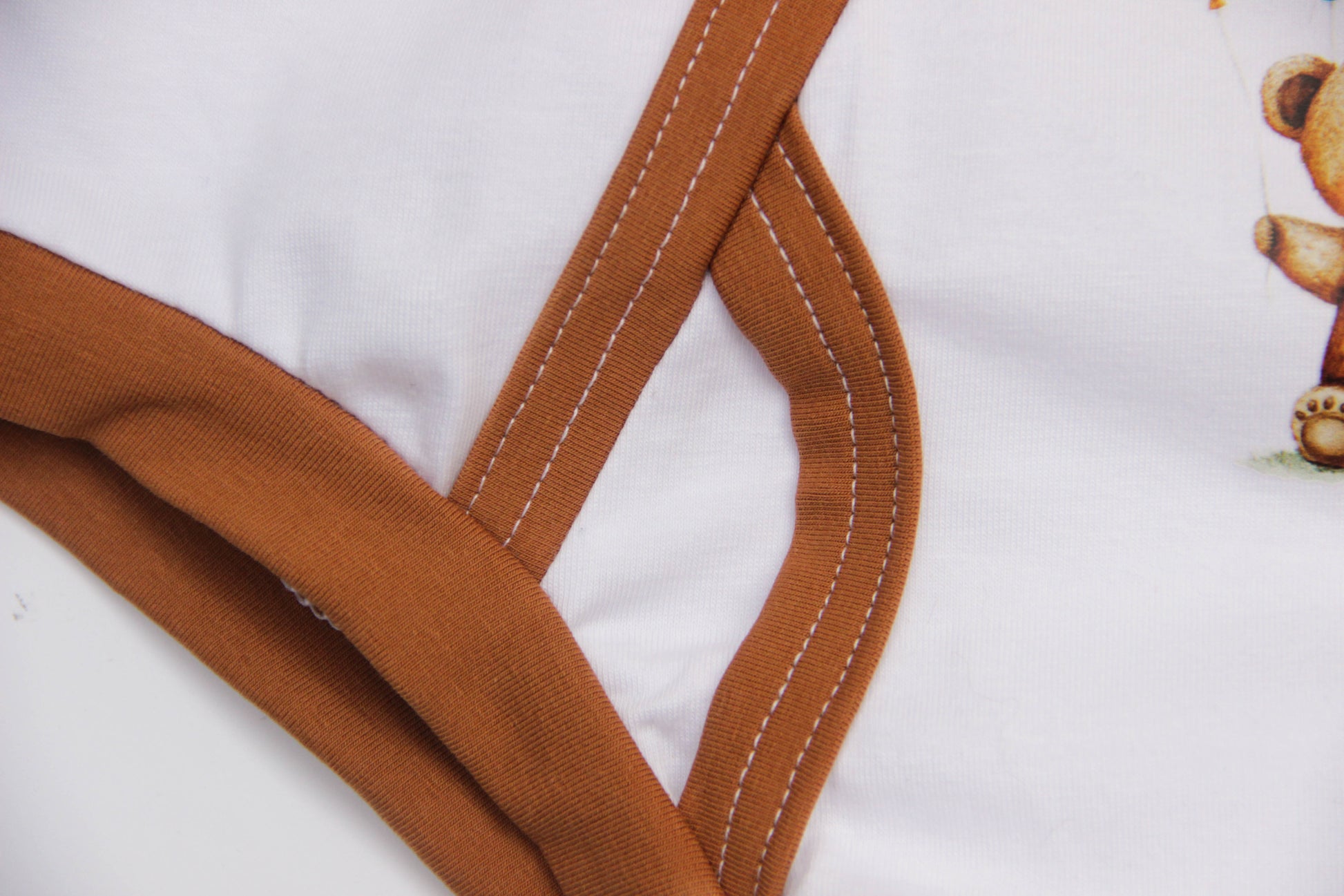 Soft pink bear print underwear for adults – folded detail shot.