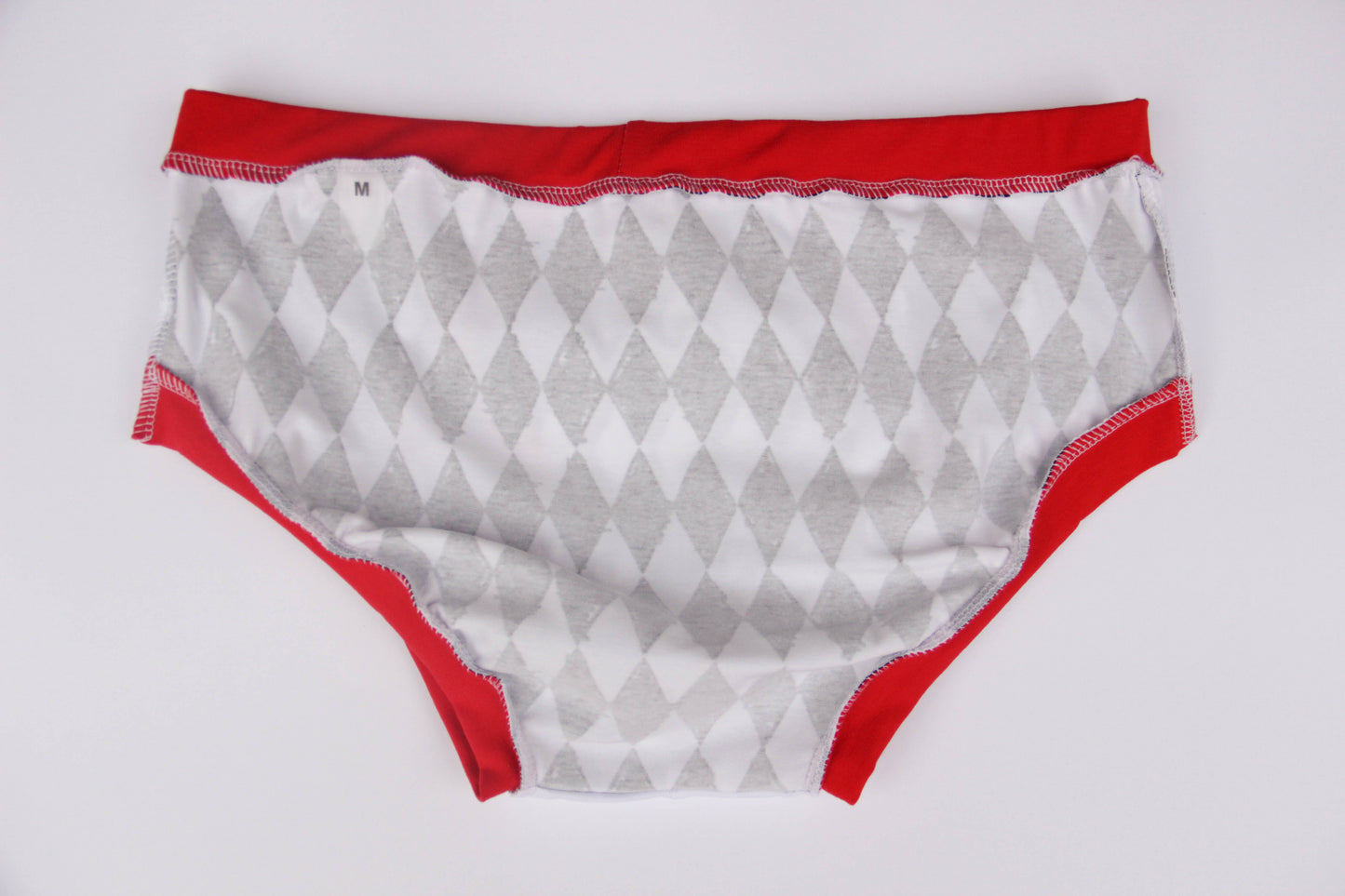ABDL briefs Harlequin cage