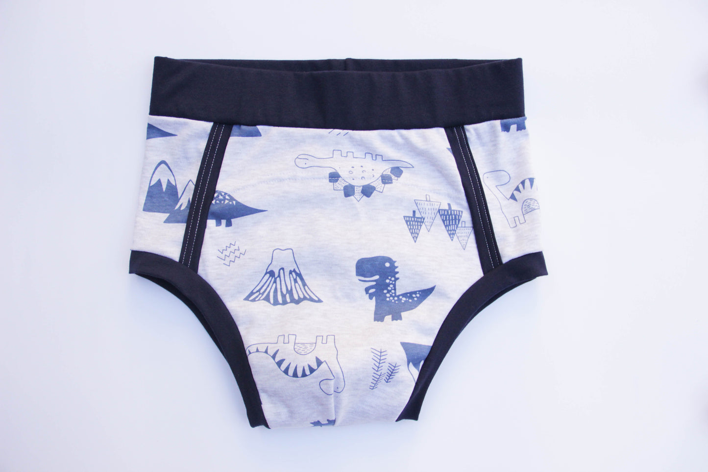 ABDL training pants for adult Dino on a gray background