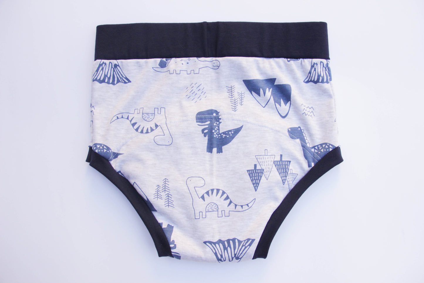 ABDL training pants for adult Dino on a gray background