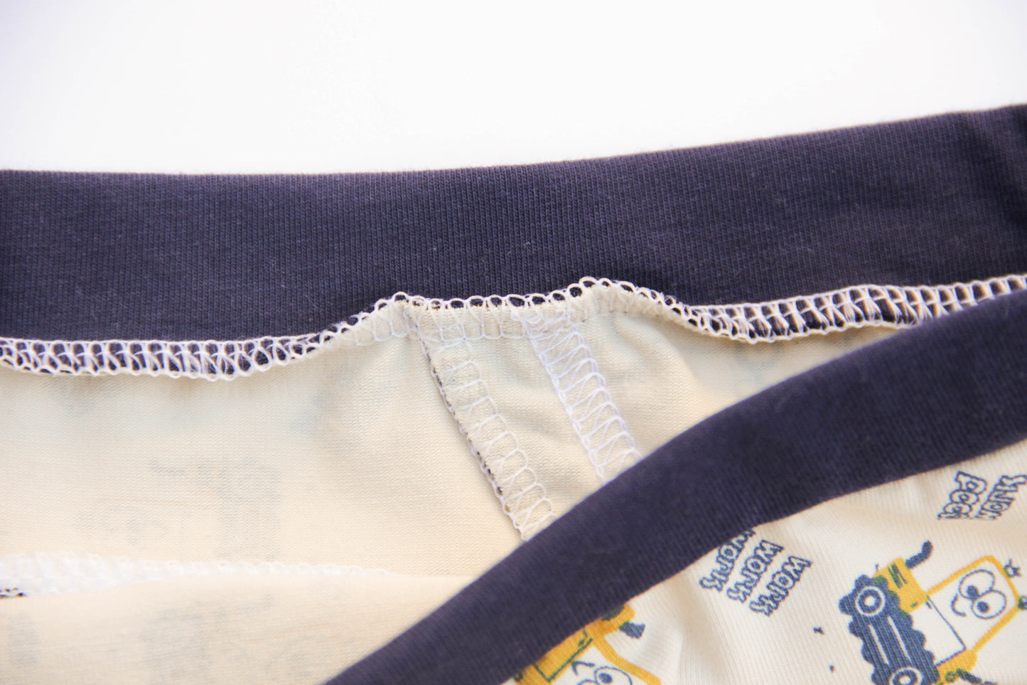 ABDL training pants for adult Tractors on a beige background