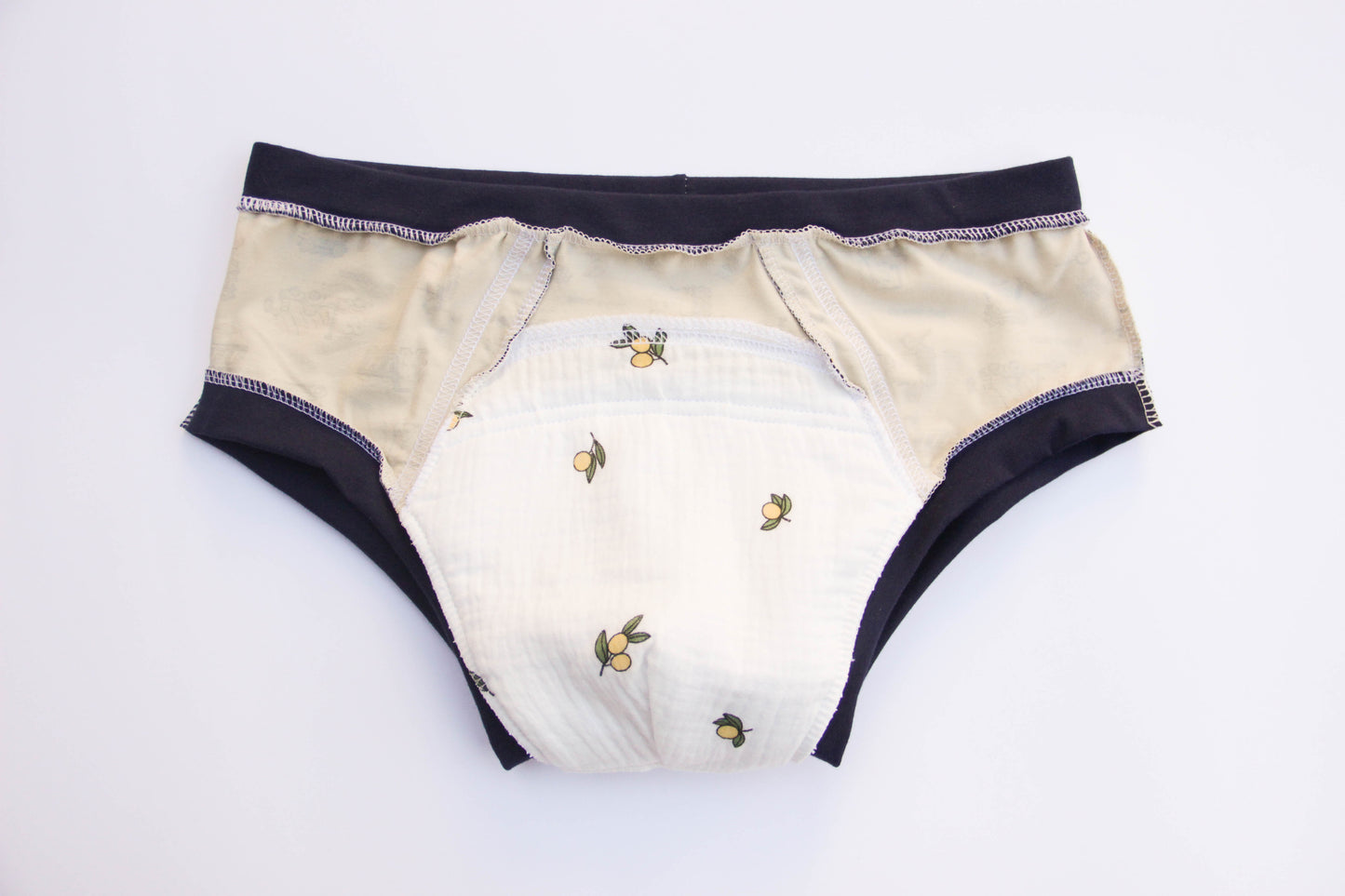 ABDL training pants for adult Tractors on a beige background