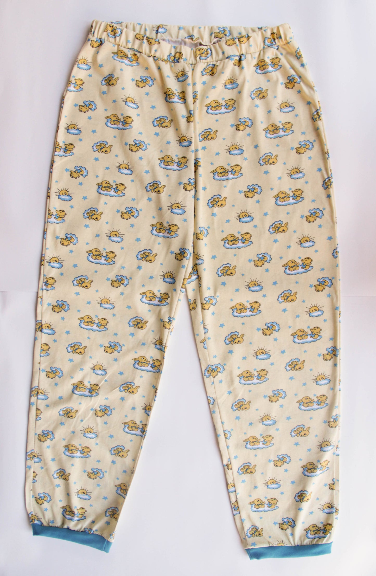 Yellow sleepwear for adults baby. Sleep suit: sweater and pants with elastic