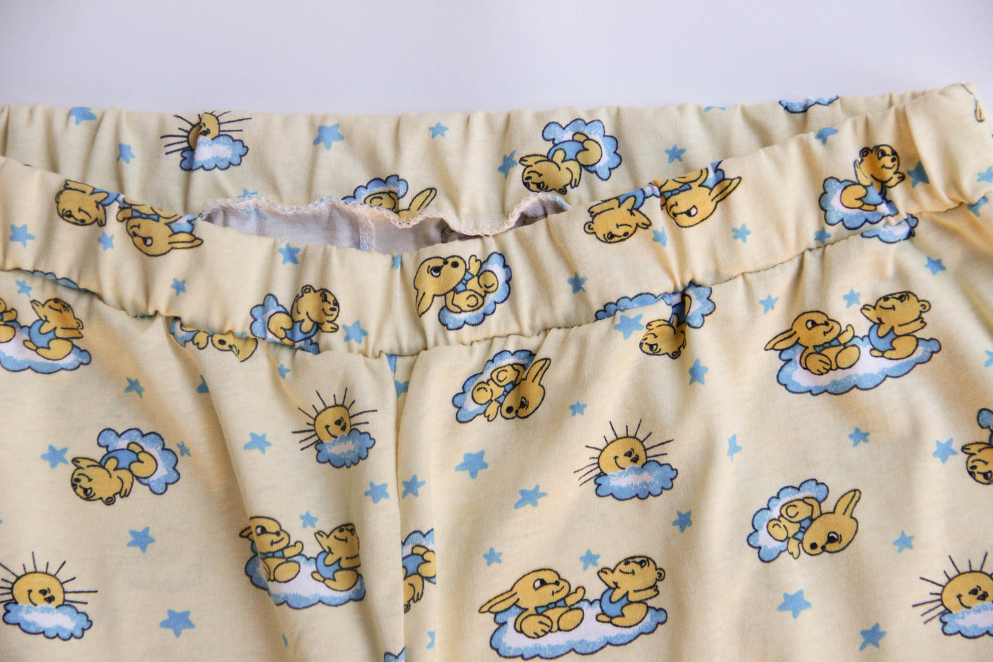 Yellow sleepwear for adults baby. Sleep suit: sweater and pants with elastic