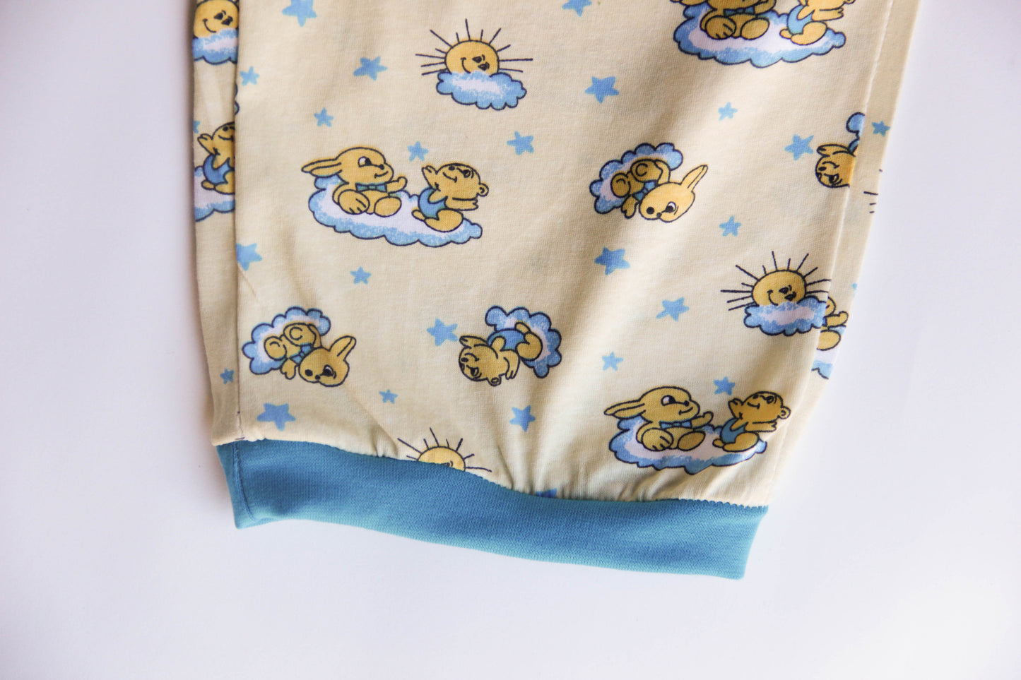 Yellow sleepwear for adults baby. Sleep suit: sweater and pants with elastic