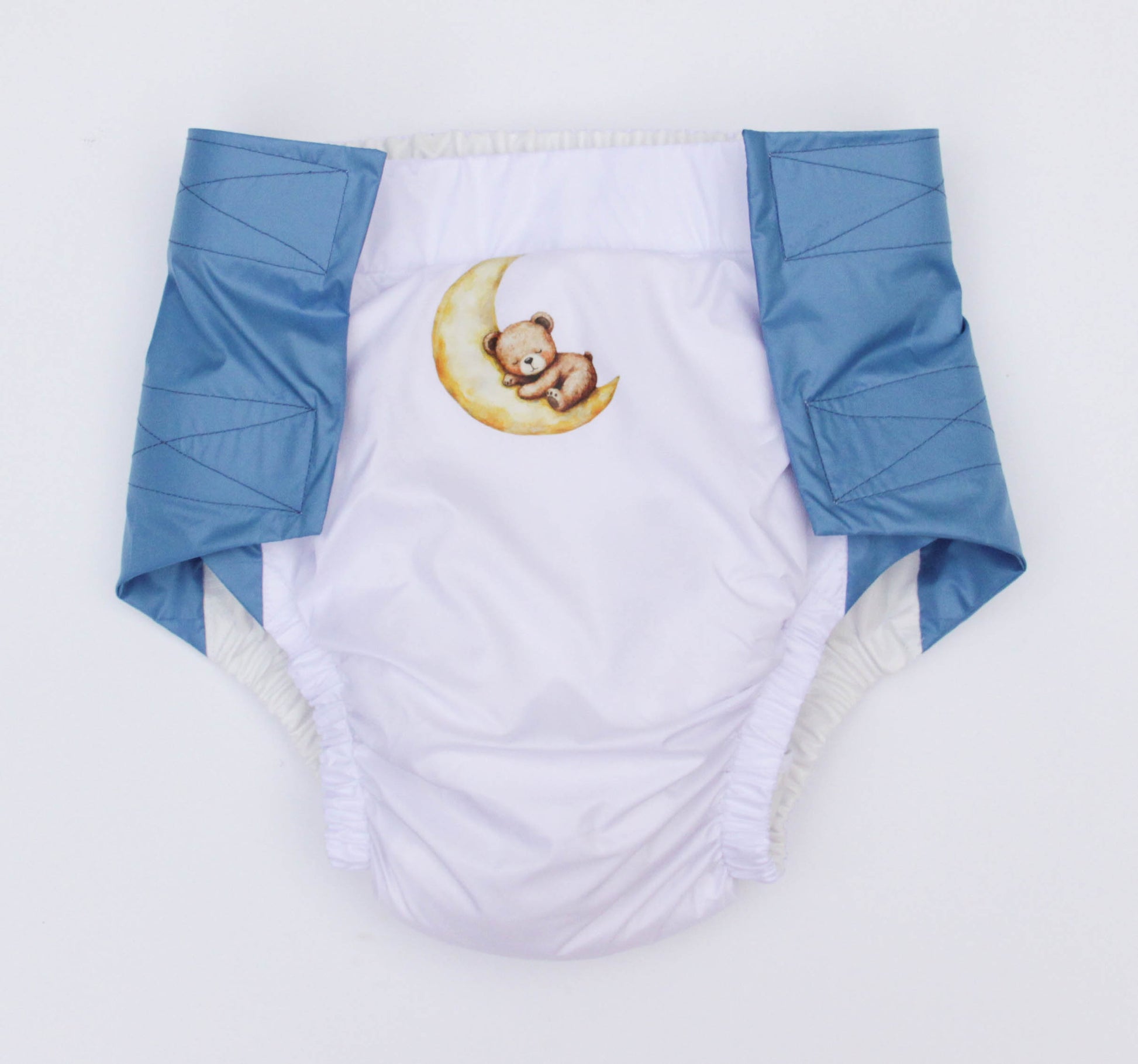 White abdl diaper with teddy bear design on a white background with Removable Insert