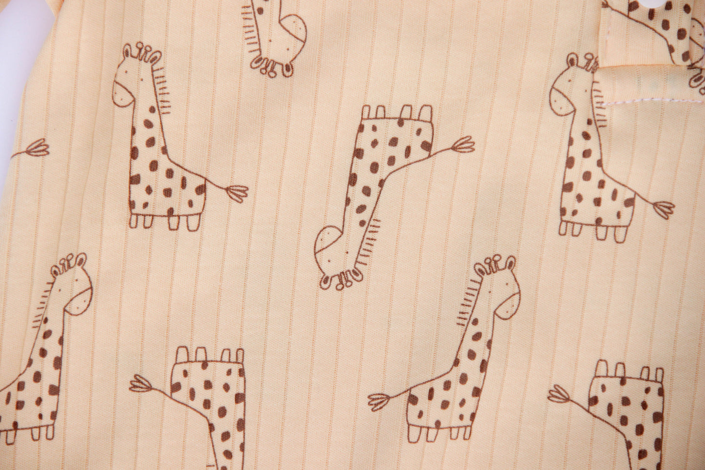 adult onesie features a cute giraffe print