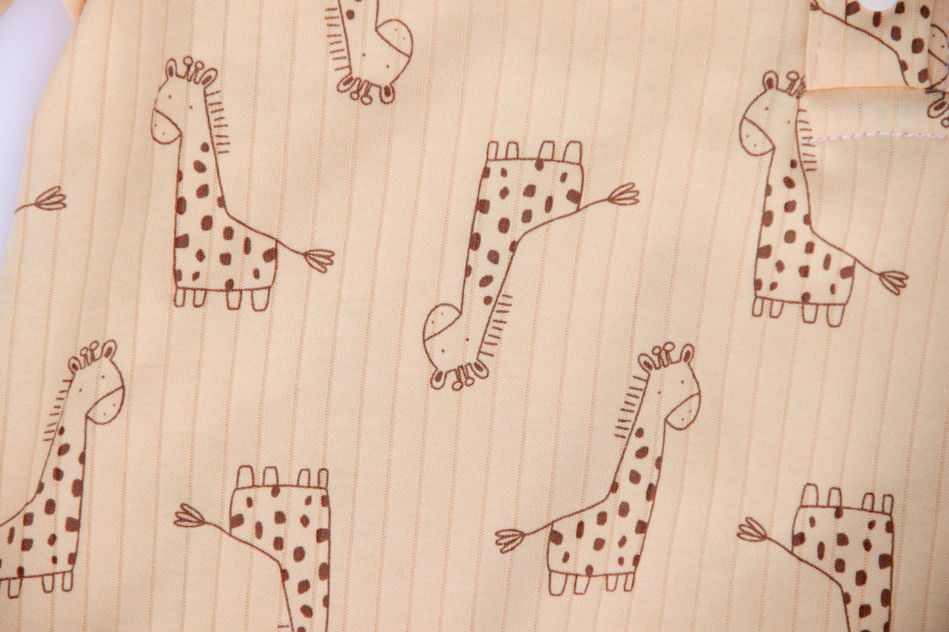 adult onesie features a cute giraffe print
